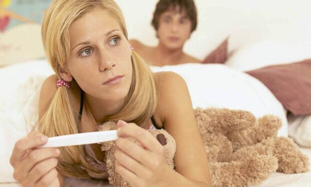 A girl with a pregnancy test